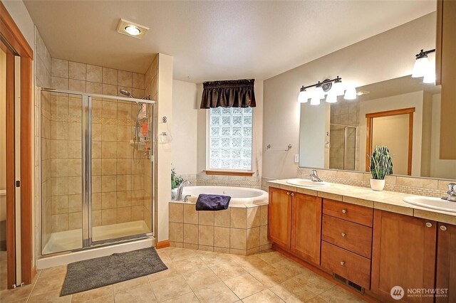 2102 256th St NW, Stanwood, WA 98292 - bathroom with a bath, tile patterned flooring, a stall shower, and double vanity
