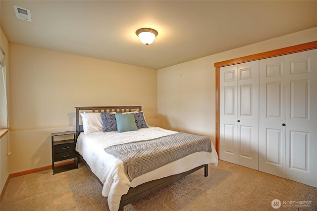 2102 256th St NW, Stanwood, WA 98292 - bedroom with light colored carpet and a closet