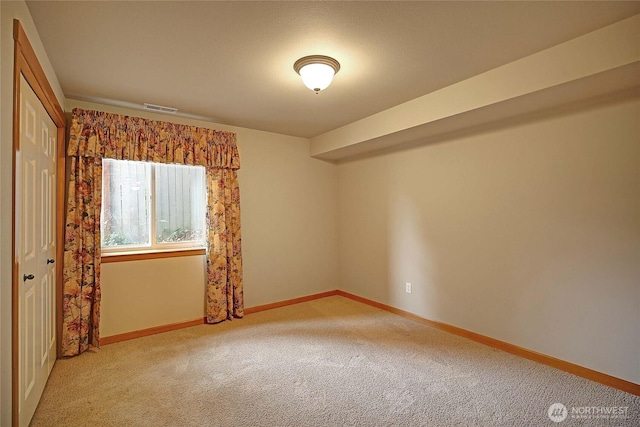 2102 256th St NW, Stanwood, WA 98292 - carpeted empty room featuring baseboards