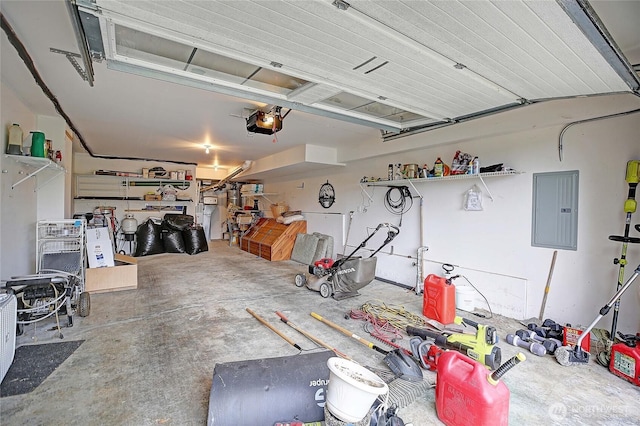 2102 256th St NW, Stanwood, WA 98292 - garage featuring electric panel and a garage door opener
