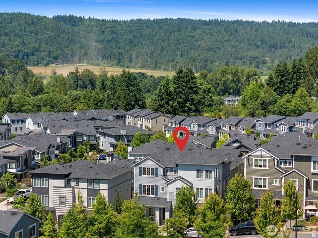 14031 3rd Ave NE, Duvall, WA 98019 - aerial view of residential area with a forest