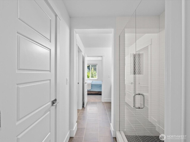 14031 3rd Ave NE, Duvall, WA 98019 - full bath with ensuite bath, a shower stall, and tile patterned floors