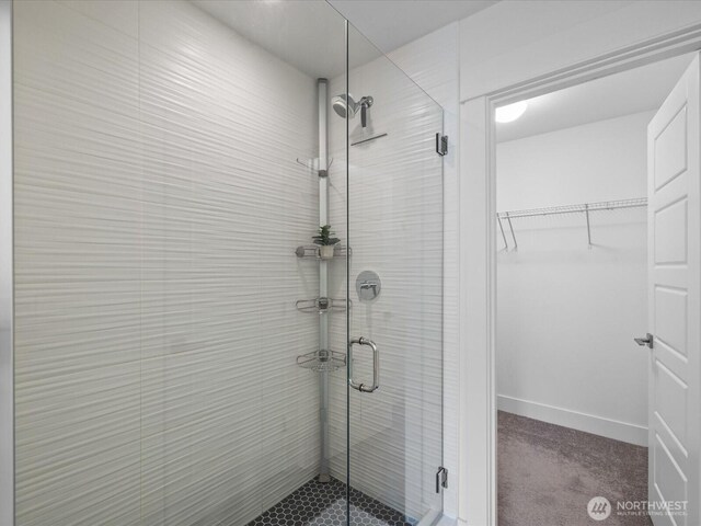 14031 3rd Ave NE, Duvall, WA 98019 - bathroom featuring a shower stall and a walk in closet