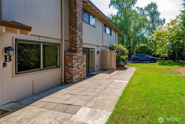 2822 Garden Ct Unit B, Steilacoom, WA 98388 - view of property exterior featuring a lawn