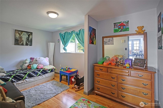 858 Westview Ct, Camano Island, WA 98282 - bedroom featuring light wood-style flooring and baseboards