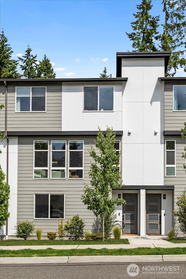 21511 50th Ave W Unit E, Mountlake Terrace, WA 98043 - view of front of home with stucco siding
