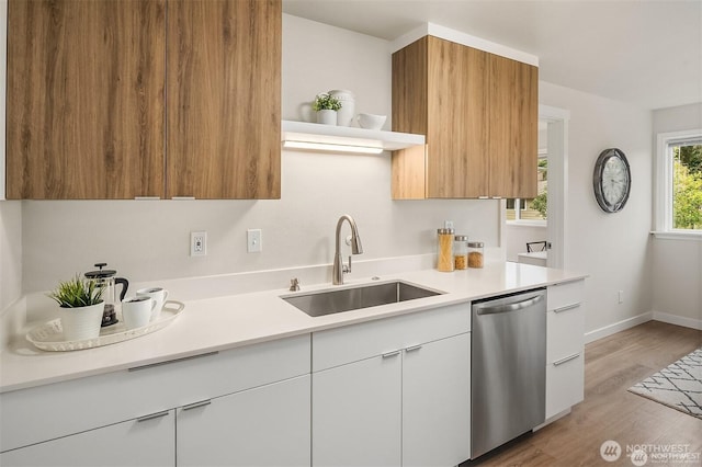 19428 N Aurora Ave Unit 236, Shoreline, WA 98133 - kitchen featuring stainless steel dishwasher, light countertops, open shelves, and modern cabinets