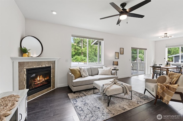 4246 Stonecrest Ct, Bellingham, WA 98226 - living area featuring dark wood finished floors, a premium fireplace, ceiling fan, and recessed lighting