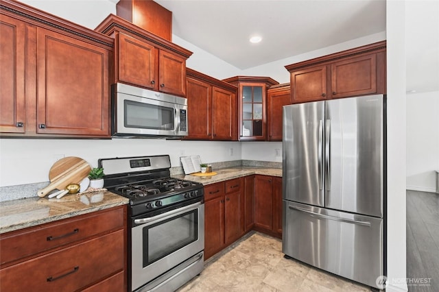 4246 Stonecrest Ct, Bellingham, WA 98226 - kitchen featuring appliances with stainless steel finishes, light stone counters, glass insert cabinets, and recessed lighting