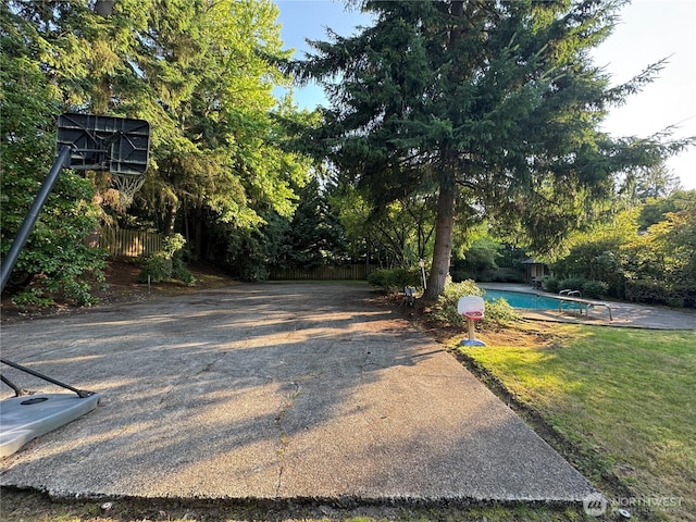 8855 Points Dr NE, Clyde Hill, WA 98004 - view of yard featuring an outdoor pool