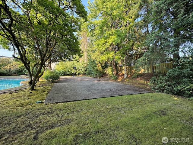 8855 Points Dr NE, Clyde Hill, WA 98004 - view of yard with an outdoor pool and a patio