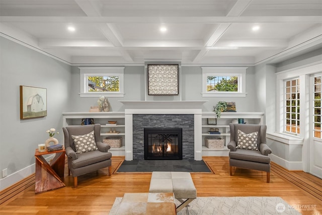 2836 32nd Ave S, Seattle, WA 98144 - sitting room featuring wood finished floors, a stone fireplace, beam ceiling, recessed lighting, and coffered ceiling