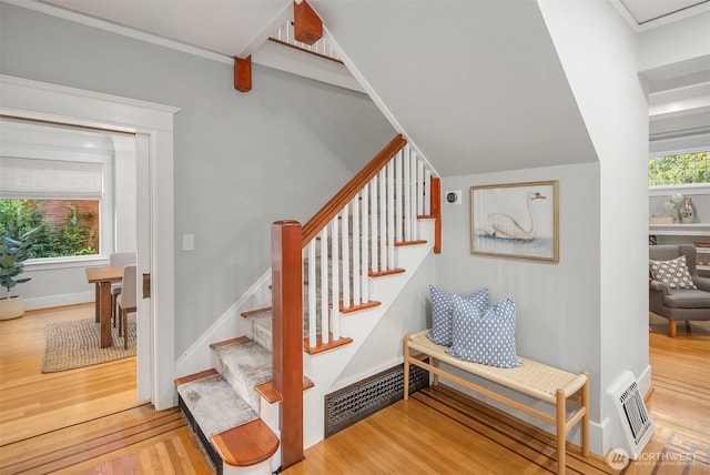 2836 32nd Ave S, Seattle, WA 98144 - staircase with wood finished floors and crown molding