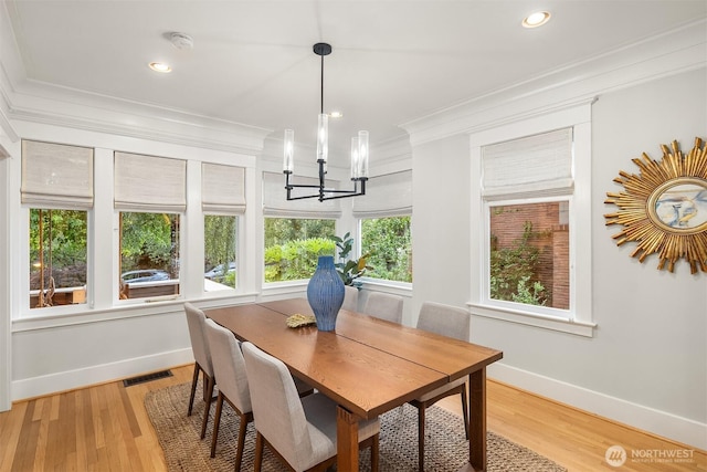 2836 32nd Ave S, Seattle, WA 98144 - dining room with crown molding, a chandelier, light wood-type flooring, and recessed lighting