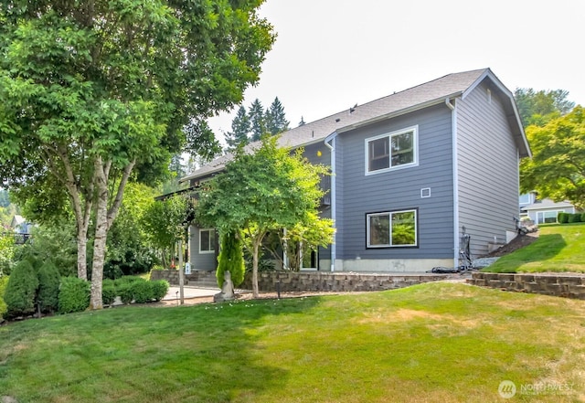 15205 197th St E, Orting, WA 98360 - rear view of house featuring a yard