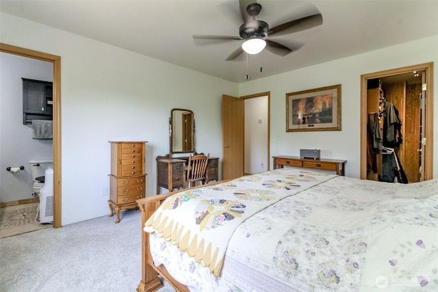 15205 197th St E, Orting, WA 98360 - bedroom featuring light carpet, a spacious closet, a closet, ensuite bathroom, and a ceiling fan