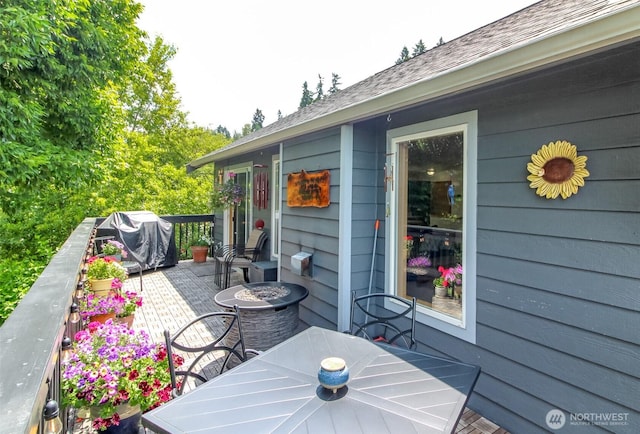 15205 197th St E, Orting, WA 98360 - wooden deck featuring outdoor dining area and grilling area