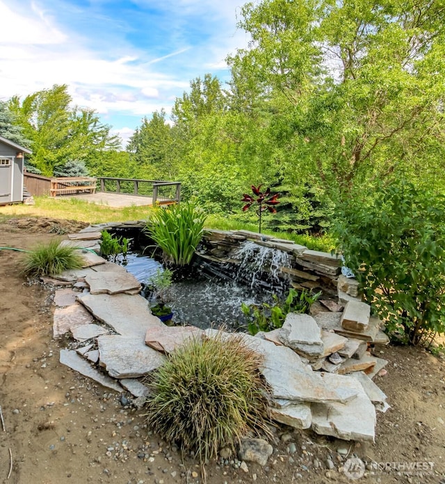 15205 197th St E, Orting, WA 98360 - view of yard with a garden pond