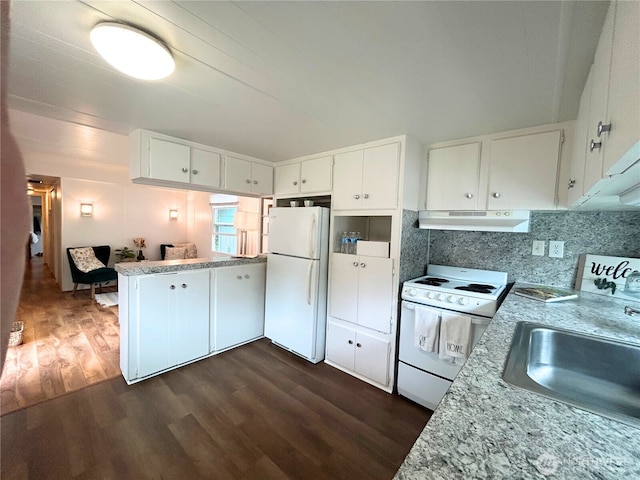 105 E Cox Ave Unit 13, Arlington, WA 98223 - kitchen featuring white appliances, range hood, dark wood-type flooring, a peninsula, and light countertops