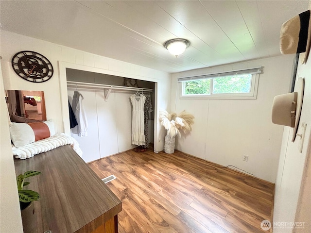 105 E Cox Ave Unit 13, Arlington, WA 98223 - bedroom with light wood-type flooring and a closet