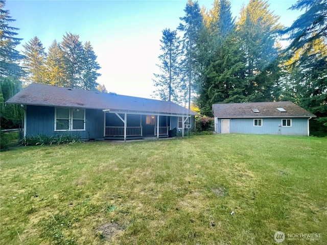 2029 87th Ct SW, Olympia, WA 98512 - rear view of house with a lawn