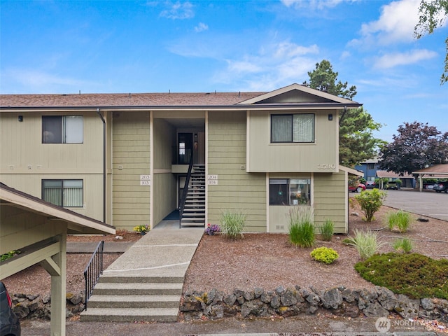 3590 Narrows View Ln NE Unit 203, Bremerton, WA 98310 - view of front of house featuring stairs