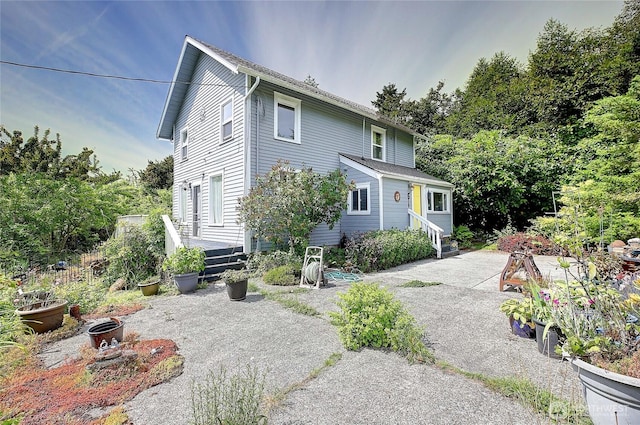 522 Chapman Rd, Camano Island, WA 98282 - view of front facade with a patio area and a deck