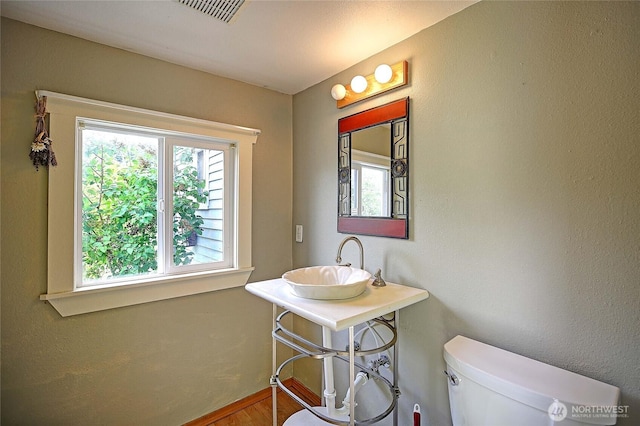 522 Chapman Rd, Camano Island, WA 98282 - half bath with a sink and wood finished floors