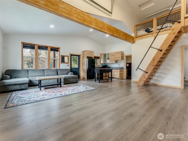 291 Hadaller Rd, Mossyrock, WA 98564 - living room with stairs, light wood-style flooring, recessed lighting, and high vaulted ceiling