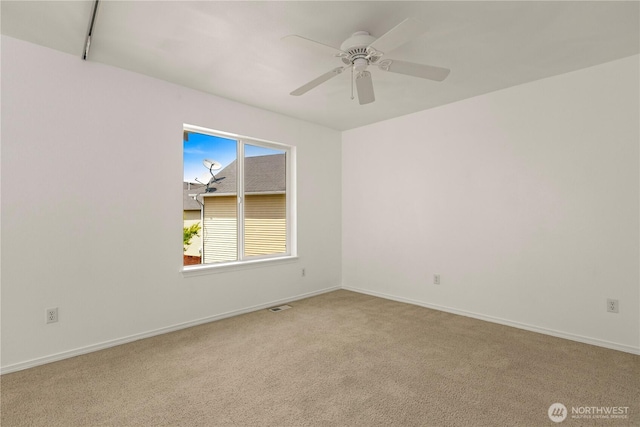 331 Index Ave SE, Renton, WA 98056 - spare room with carpet floors and ceiling fan