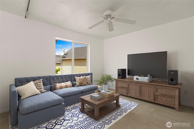 331 Index Ave SE, Renton, WA 98056 - living area featuring a ceiling fan and light colored carpet