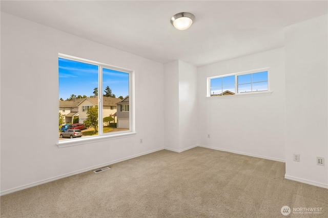 331 Index Ave SE, Renton, WA 98056 - carpeted spare room featuring baseboards