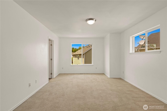 331 Index Ave SE, Renton, WA 98056 - spare room with healthy amount of natural light and carpet flooring