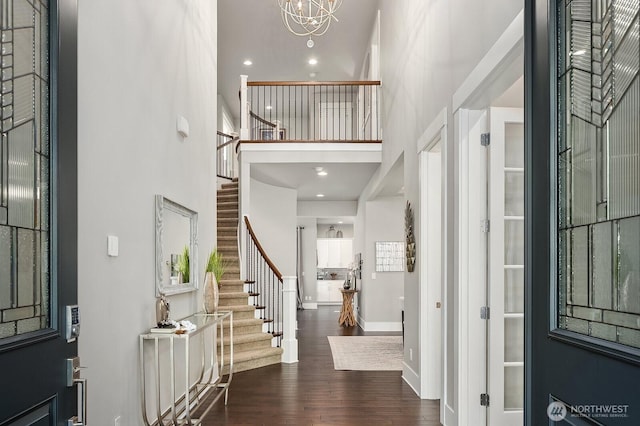 2283 244th Ave SE, Sammamish, WA 98075 - foyer featuring stairway, a towering ceiling, dark wood-style floors, a chandelier, and recessed lighting