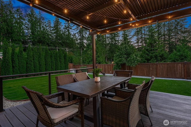 2283 244th Ave SE, Sammamish, WA 98075 - deck featuring a fenced backyard, outdoor dining space, and view of scattered trees