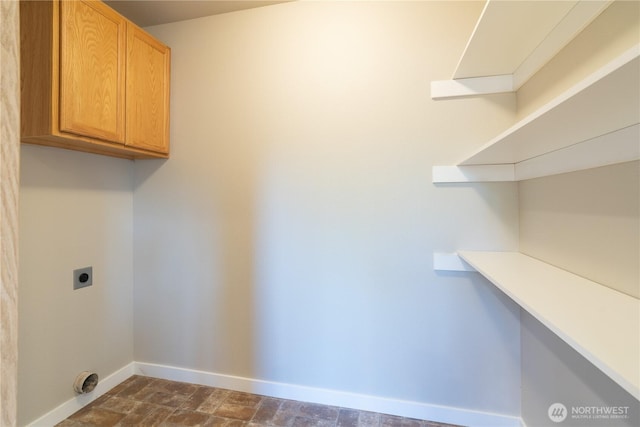 9960 Locust Ct SE, Yelm, WA 98597 - laundry area featuring hookup for an electric dryer and cabinet space