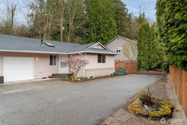 21312 87th Ave NE Unit 1 & 2, Arlington, WA 98223 - ranch-style home with roof with shingles, an attached garage, and driveway
