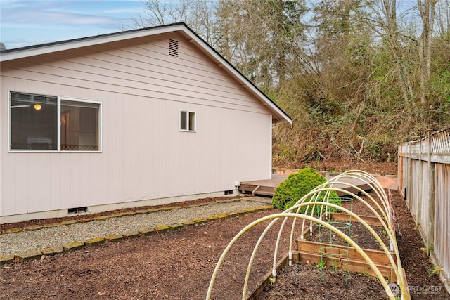 21312 87th Ave NE Unit 1 & 2, Arlington, WA 98223 - view of property exterior with crawl space and a vegetable garden