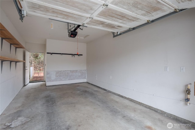 21312 87th Ave NE Unit 1 & 2, Arlington, WA 98223 - garage featuring a garage door opener