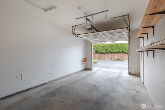 21312 87th Ave NE Unit 1 & 2, Arlington, WA 98223 - garage featuring a garage door opener