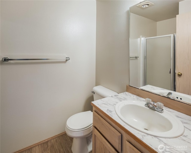 21312 87th Ave NE Unit 1 & 2, Arlington, WA 98223 - bathroom with a stall shower, wood finished floors, and vanity
