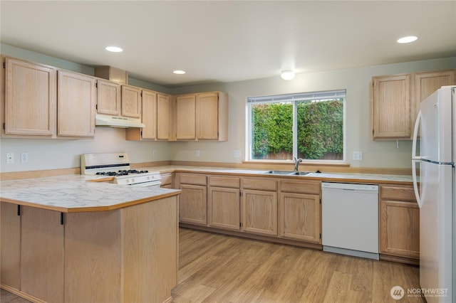 21312 87th Ave NE Unit 1 & 2, Arlington, WA 98223 - kitchen with white appliances, light brown cabinets, a peninsula, under cabinet range hood, and light wood-type flooring