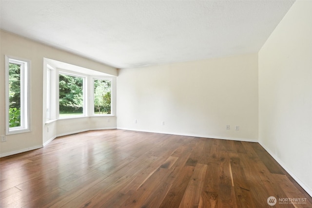 116 Noble Rd, Winlock, WA 98596 - spare room featuring hardwood / wood-style floors and baseboards