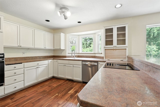 116 Noble Rd, Winlock, WA 98596 - kitchen with black appliances, white cabinetry, glass insert cabinets, dark wood-type flooring, and recessed lighting