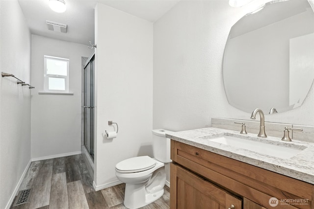 116 Noble Rd, Winlock, WA 98596 - bathroom with vanity, wood finished floors, and an enclosed shower