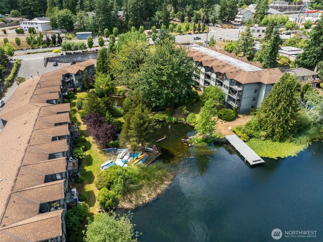 19414 Aurora Ave N Unit 203, Shoreline, WA 98133 - aerial view of property and surrounding area featuring a tree filled landscape and a nearby body of water