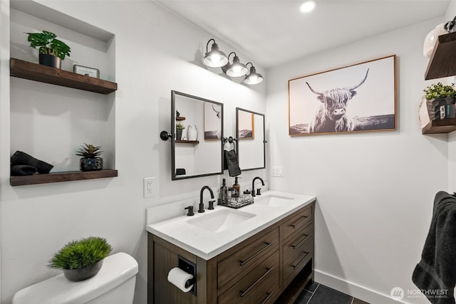 4011 65th Ave NW, Gig Harbor, WA 98335 - bathroom with double vanity, tile patterned flooring, and recessed lighting