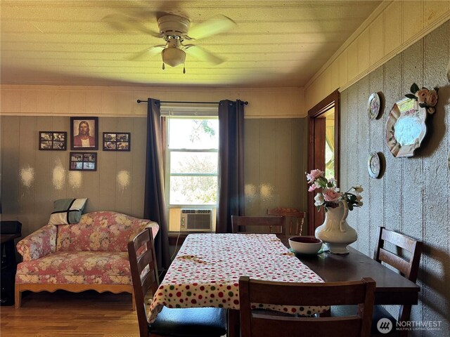 1105 Central Ave, Oroville, WA 98844 - dining room with wood finished floors, ceiling fan, and cooling unit