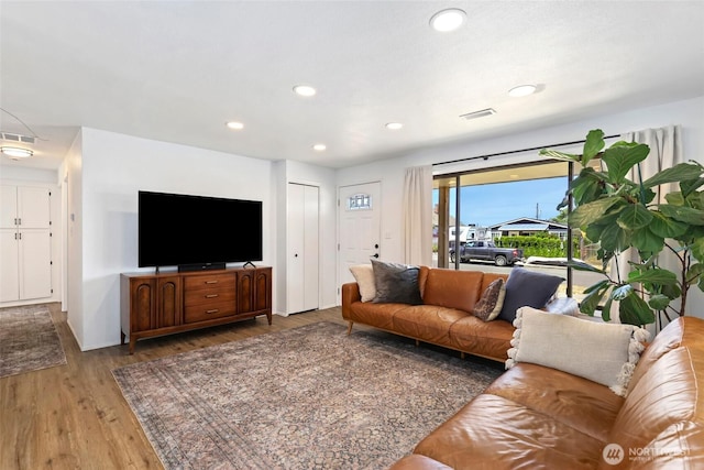 5128 N 48th St, Tacoma, WA 98407 - living room featuring wood finished floors and recessed lighting