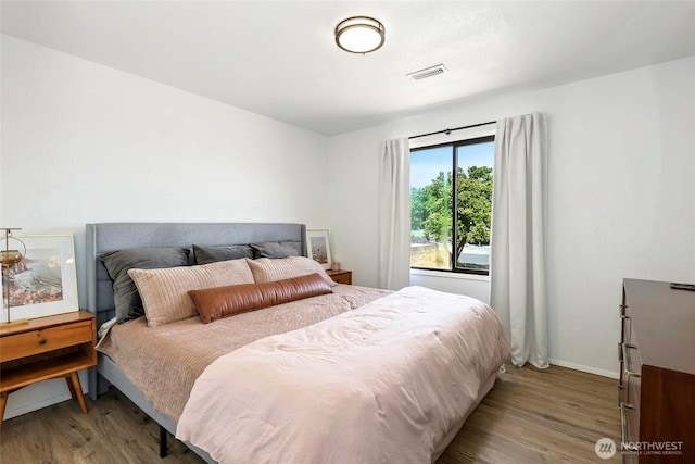 5128 N 48th St, Tacoma, WA 98407 - bedroom featuring light wood finished floors and baseboards